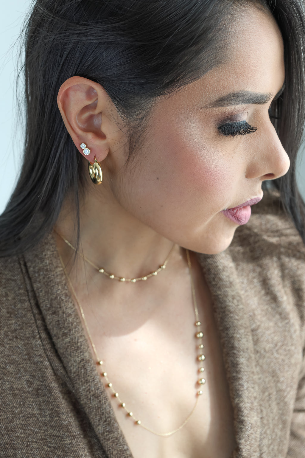 Two Zirconia Stud 18K